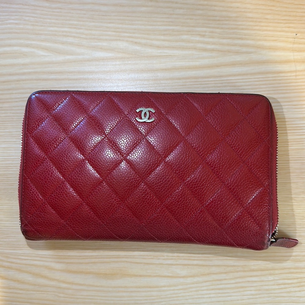 Red Chanel zip around wallet quilted caviar long